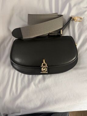 Michael Kors Black Leather Crossbody with Gold Padlock and Striped Strap